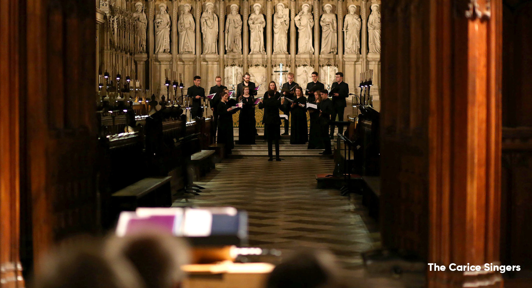 The Carice Singers performing in a church