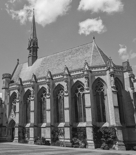 A black and white image of Exeter College Chapel and Quad on a Summer's Day